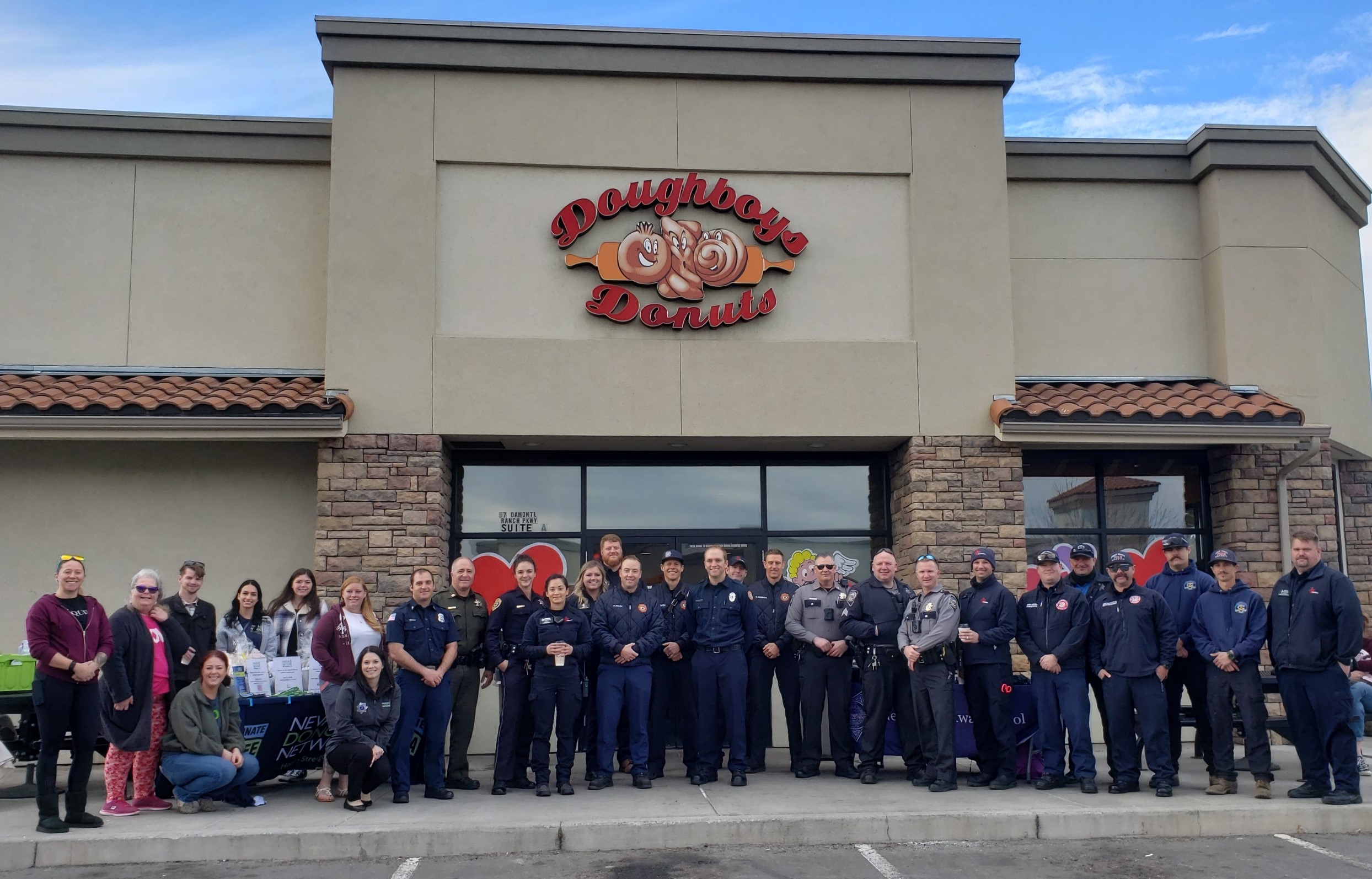 group of police officers in front of Doughboys Donuts, Jay Kenny